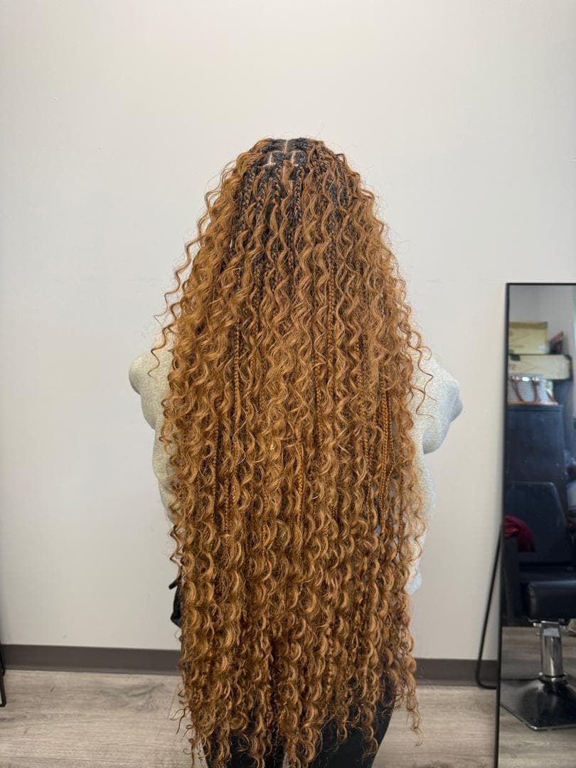 Blonde ombre knotless braids with curly ends, styled in Baltimore MD