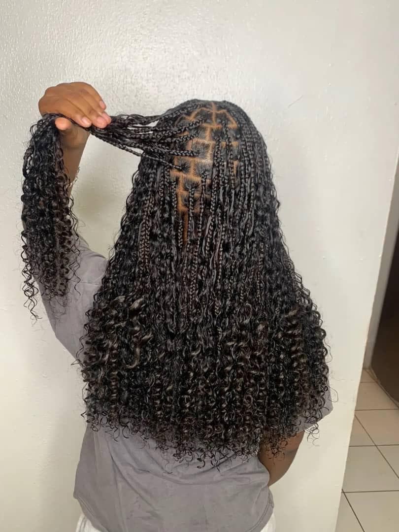Close-up of clean knotless braid parting, styled in Baltimore MD