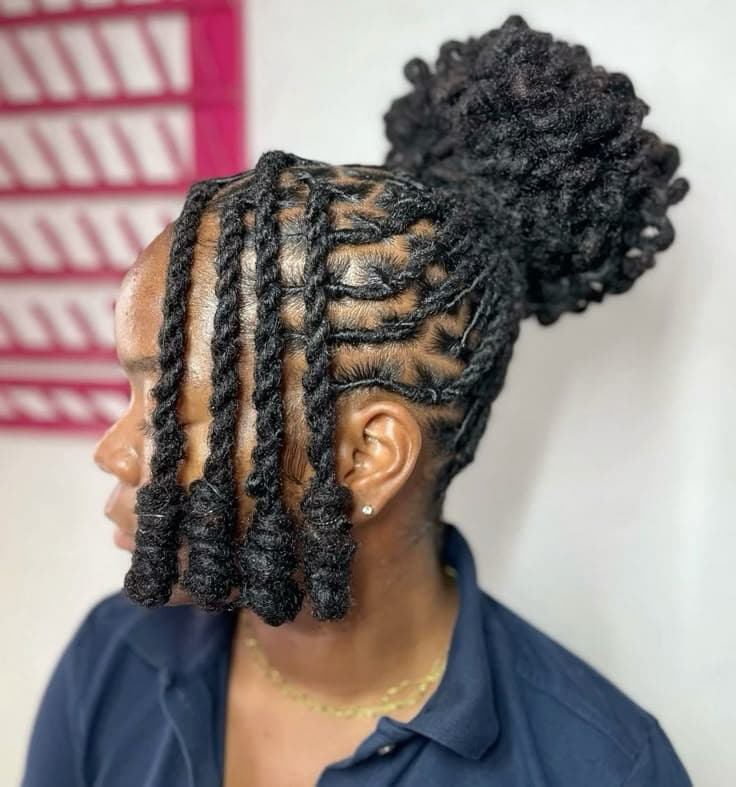 Side-swept rope twists leading into a loc bun, styled in Baltimore MD